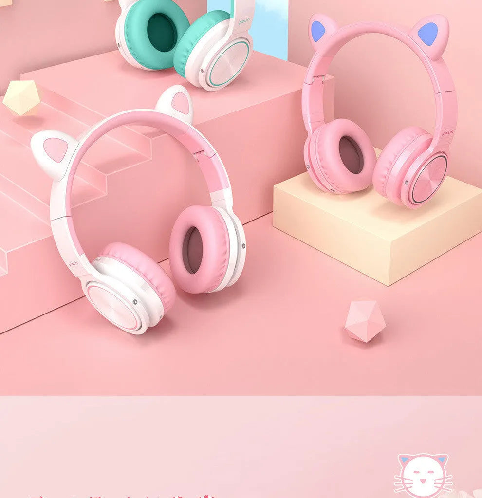 Pink and white wireless Bluetooth headset with over-ear design and 40mm speakers