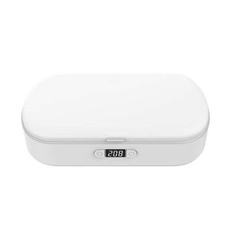White ABS plastic UV steriliser box with wireless charging for phones and jewellery.