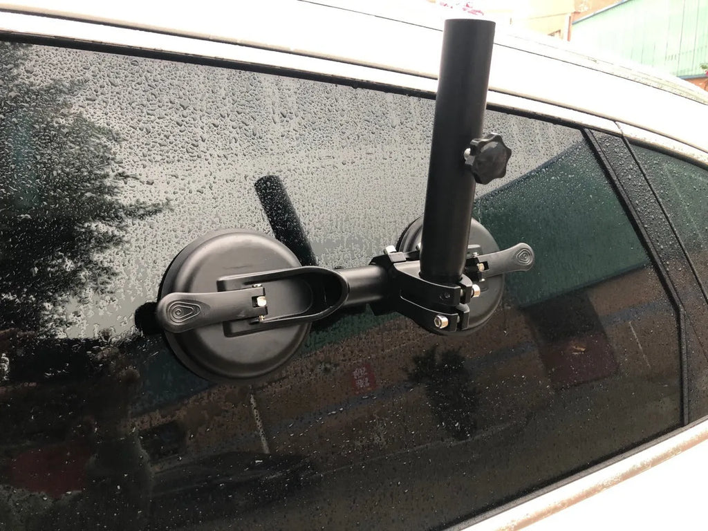 Black off-road car glass sucker mount with round rubber suction cup on ABS plastic base