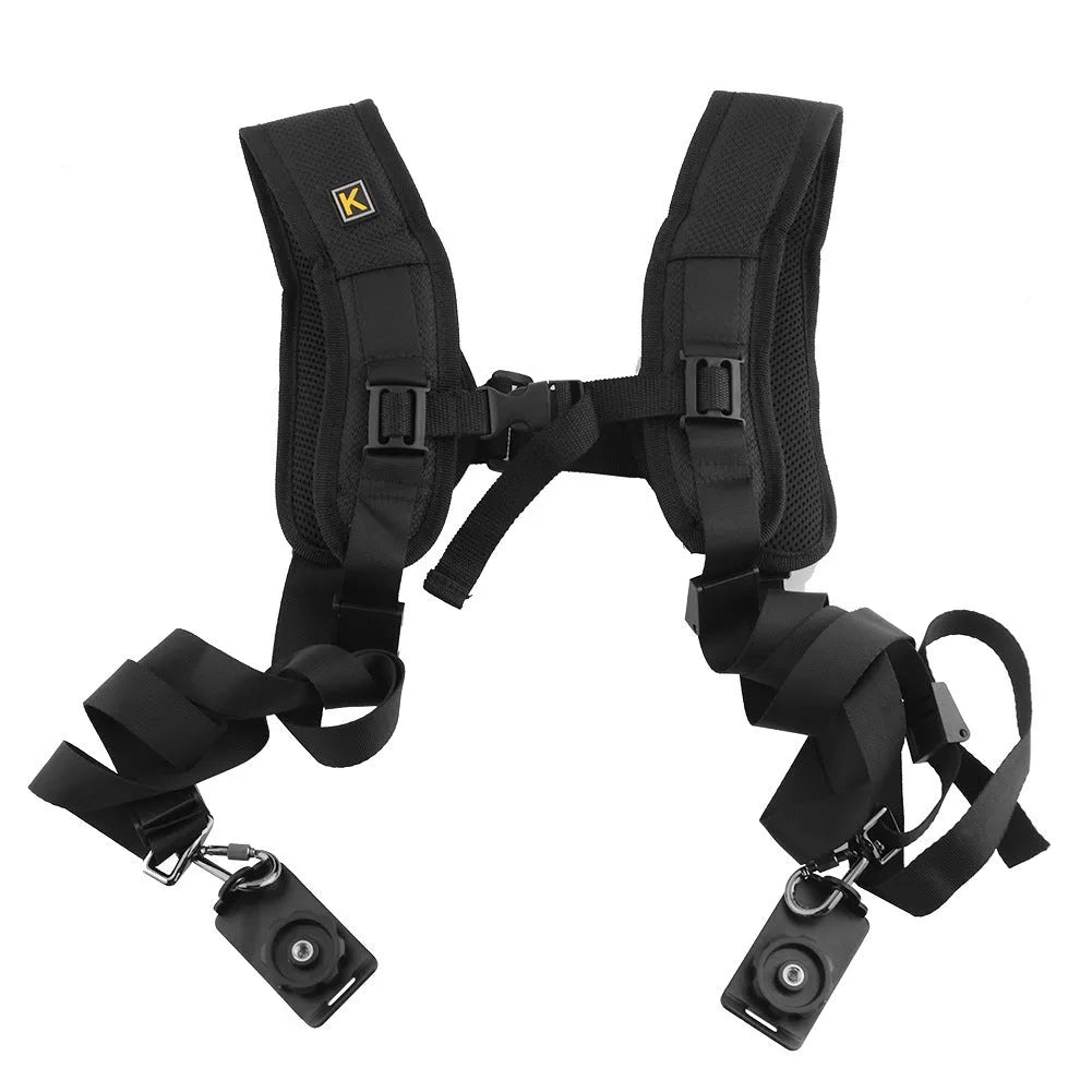 Black nylon dual SLR camera strap with thick sponge shoulder pads, shown carrying two cameras.