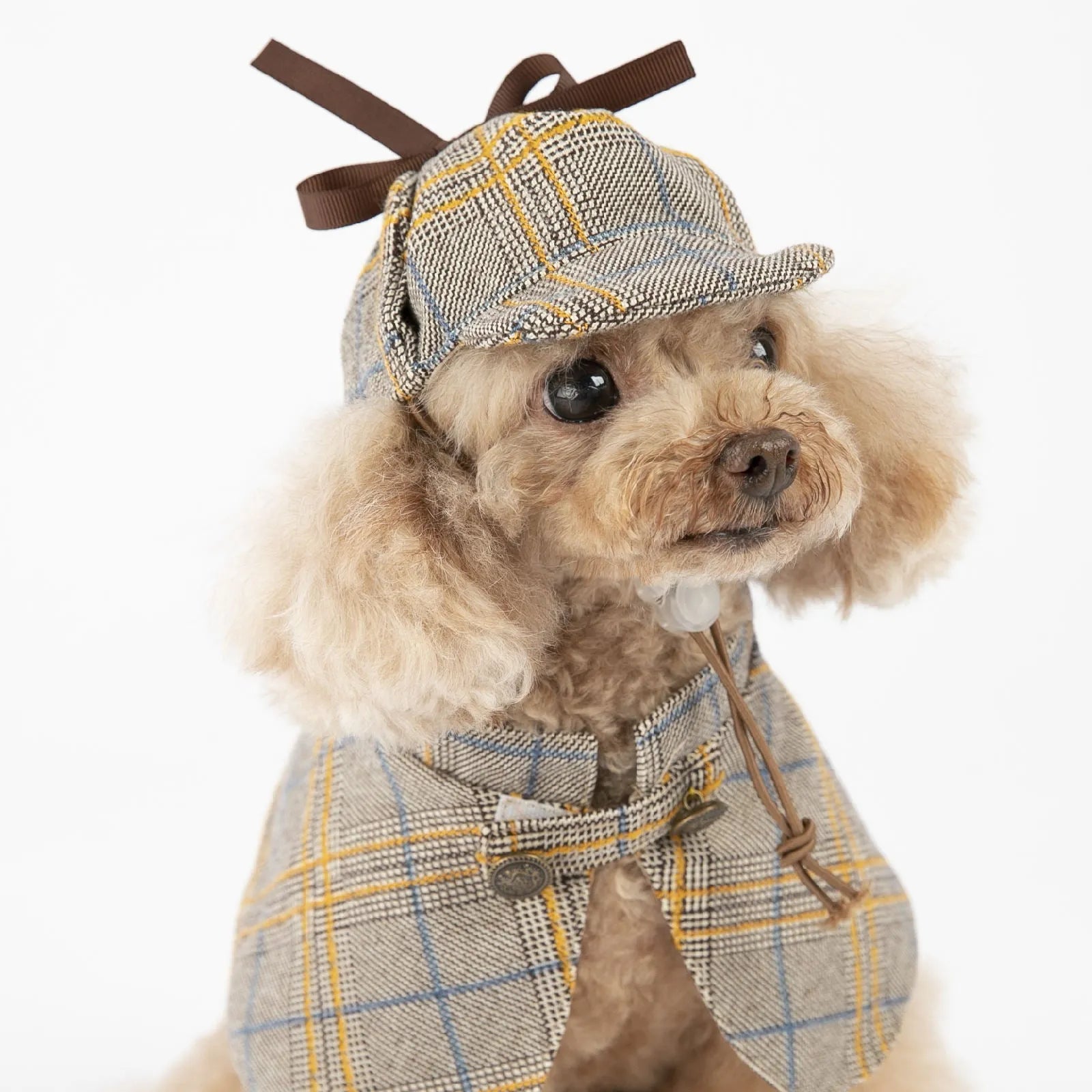Camel-coloured cotton detective cloak costume for a dog, featuring an adjustable hat.