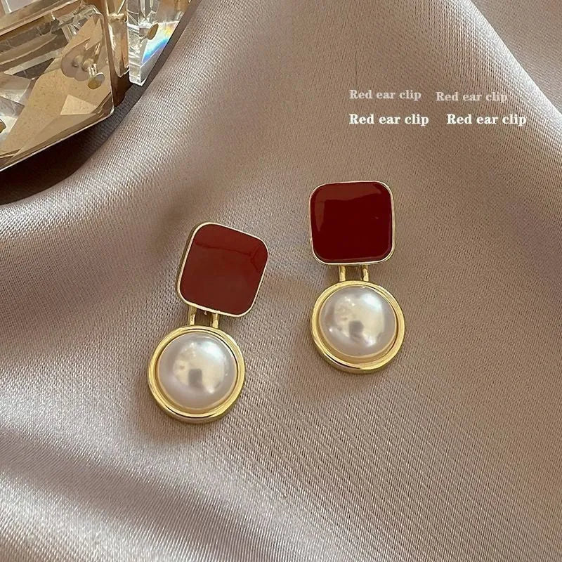 Red and blue geometric alloy stud earrings with pearl detail and quadrilateral shape, one pair