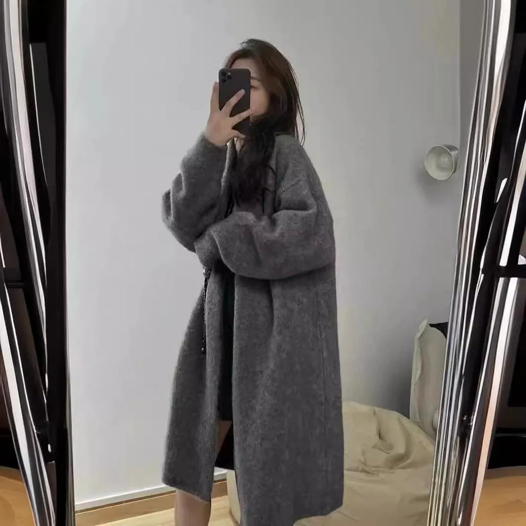 Women's mid-length knitted cardigan in loose fit with V-neck design available in five colours