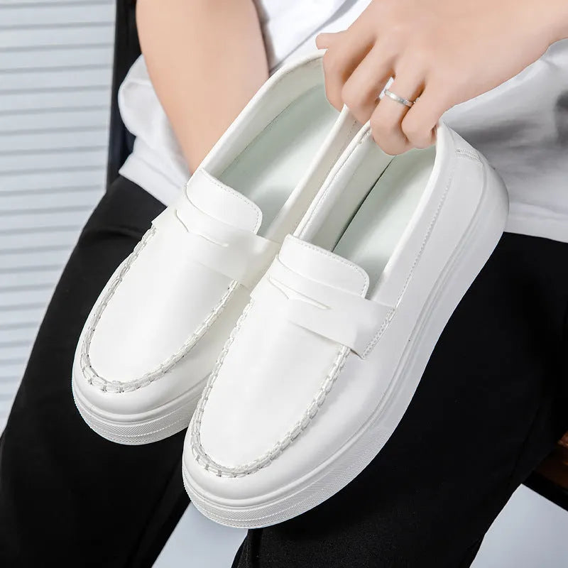 Men's casual slip-on loafers in PU leather with round toe, shown in black and white colour
