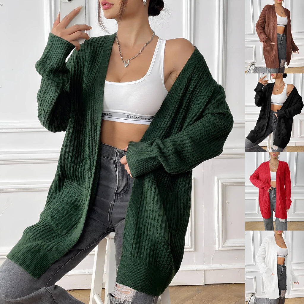 Womens double pocket acrylic cardigan in dark green colour showing mid-length design and loose fit