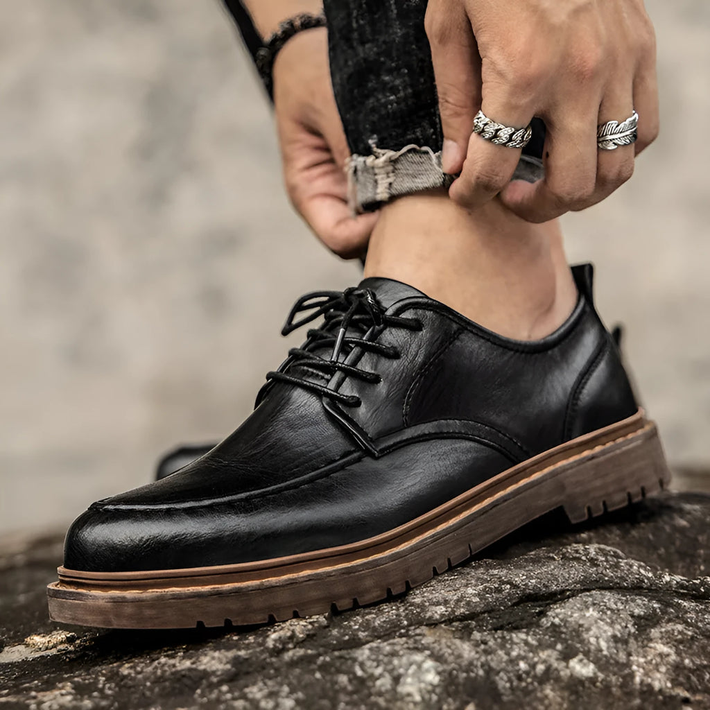 Casual leather shoes with round toe, rubber sole, and two-layer cowhide upper in black or brown colour options