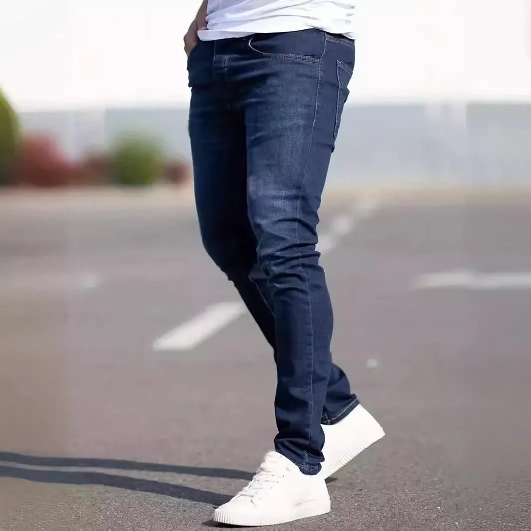 Men's slim-fit dark blue cotton jeans with mid waist and zipper fly