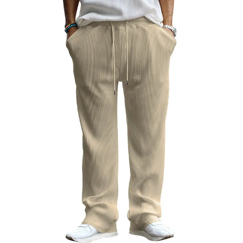 Men's loose straight-leg trousers with high waist in solid colour on hanger