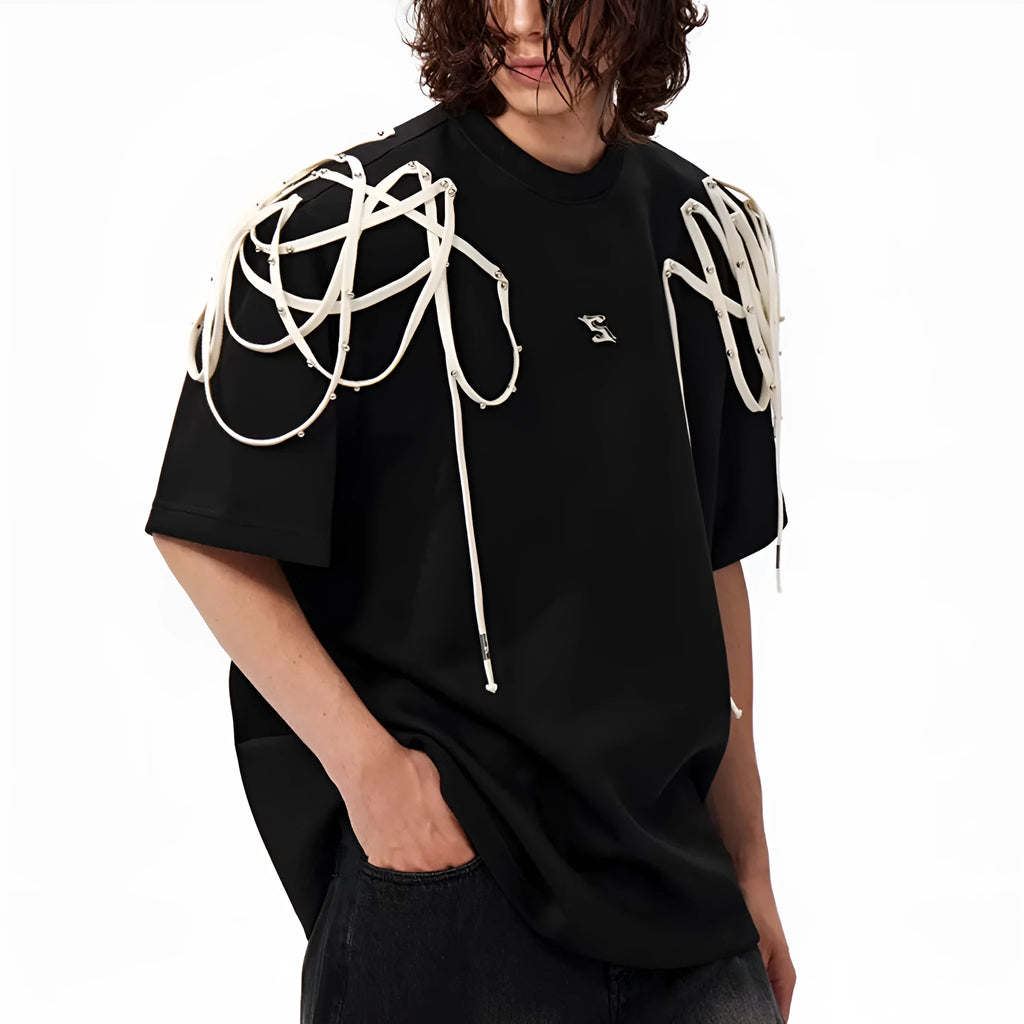 Black short-sleeved T-shirt with padded shoulders and rivet ribbon detail in loose fit style