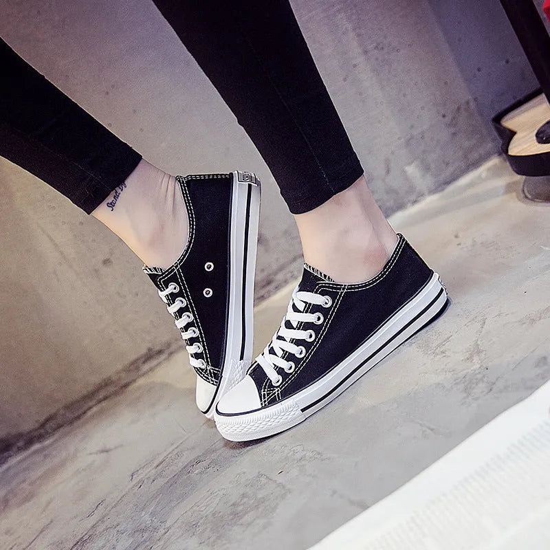 Women's solid colour canvas casual shoes in black, white black, white red, and all black.