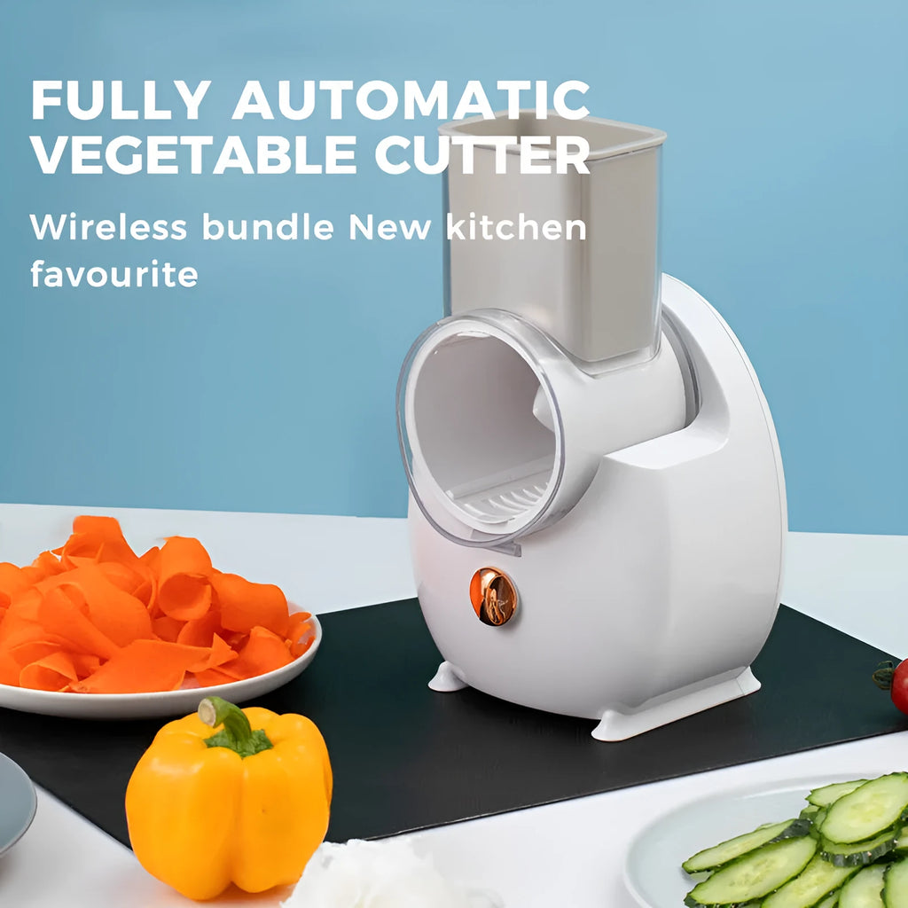 White electric vegetable slicer with suction base and interchangeable blades for automatic cutting