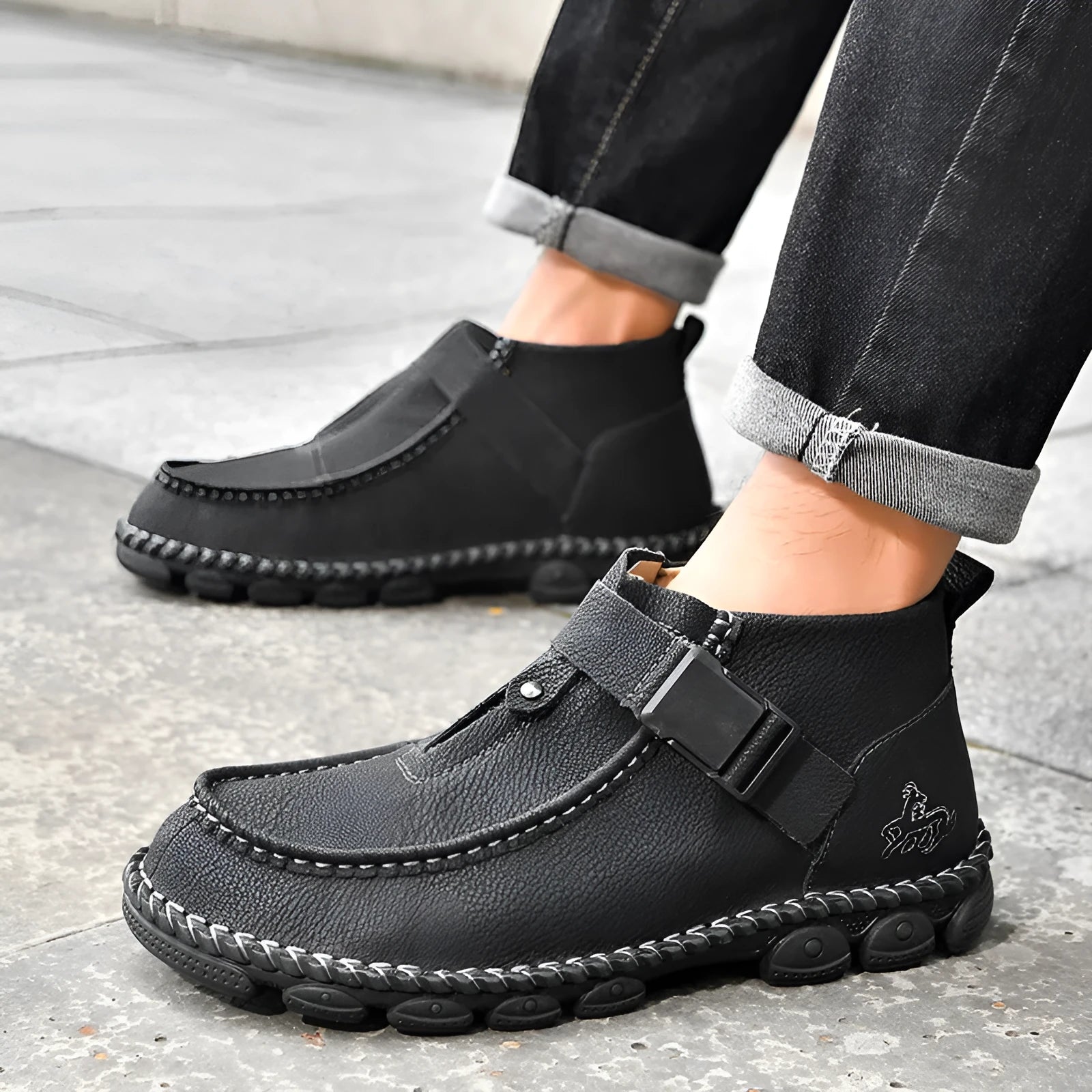 Handmade stitching casual flat bottom slip-on lazy shoes in black PU leather on a white background.