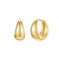 A pair of simple round geometric brass earclip earrings with a gold electroplated finish.