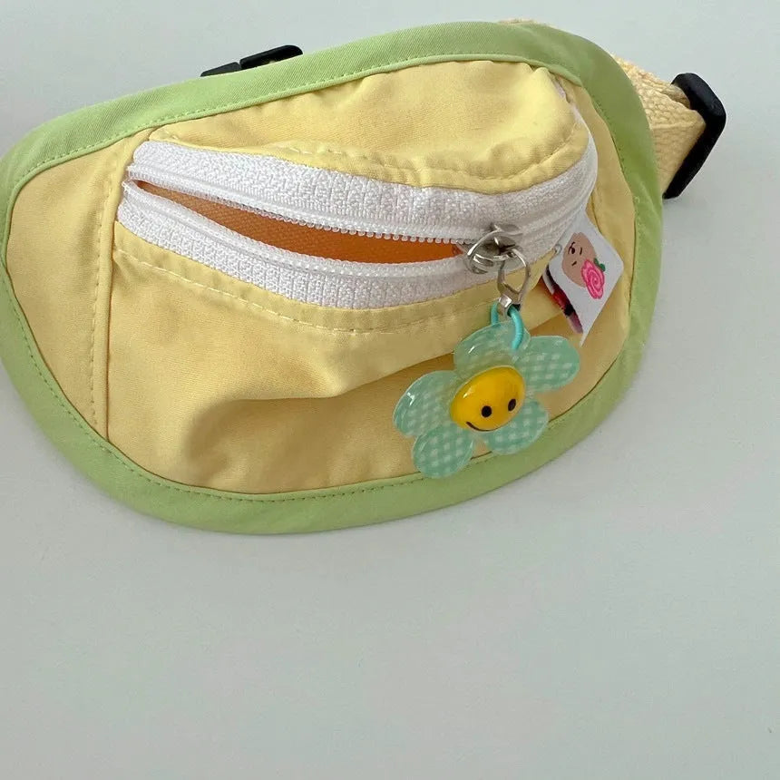 Powder blue backpack-style carrier for a small dog, showing adjustable straps and soft-sided construction.