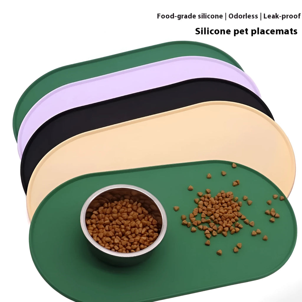 Silicone waterproof cat feeding placemat with non-slip base in beige colour on a wooden floor.