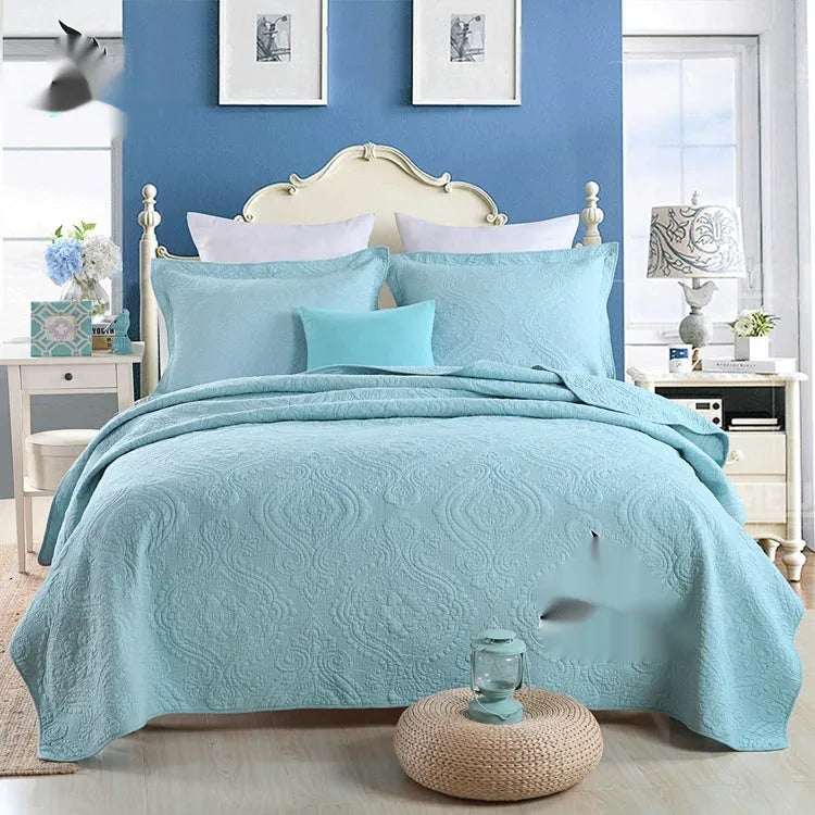 Pure cotton bedding set with damascus pattern showing embroidery details and quilted finish on bed