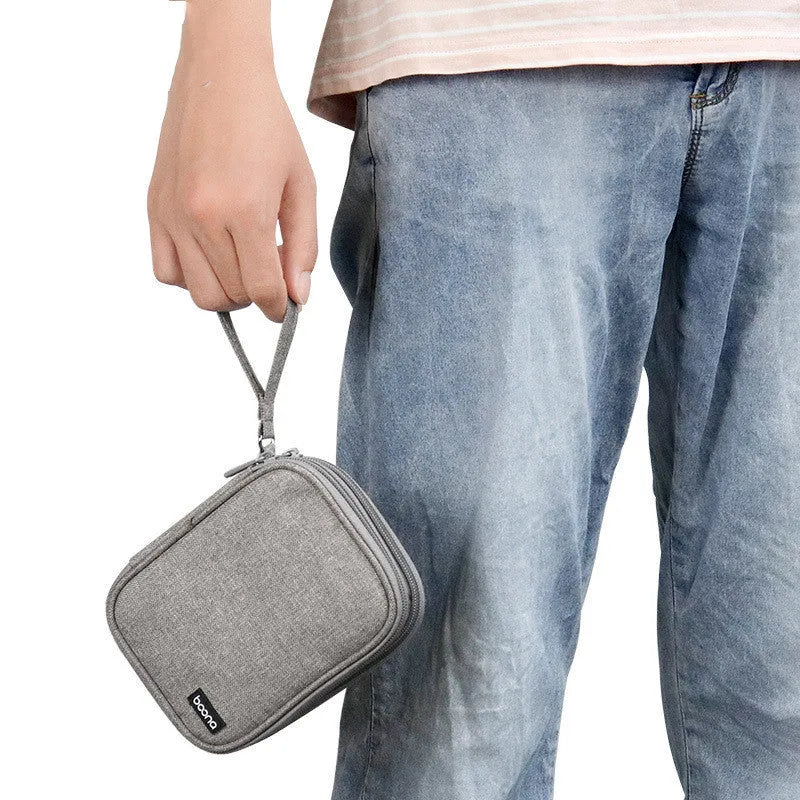 Black and grey Oxford cloth protective covers for 2.5-inch portable hard drives.
