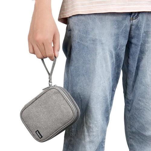 Black and grey Oxford cloth protective covers for 2.5-inch portable hard drives.