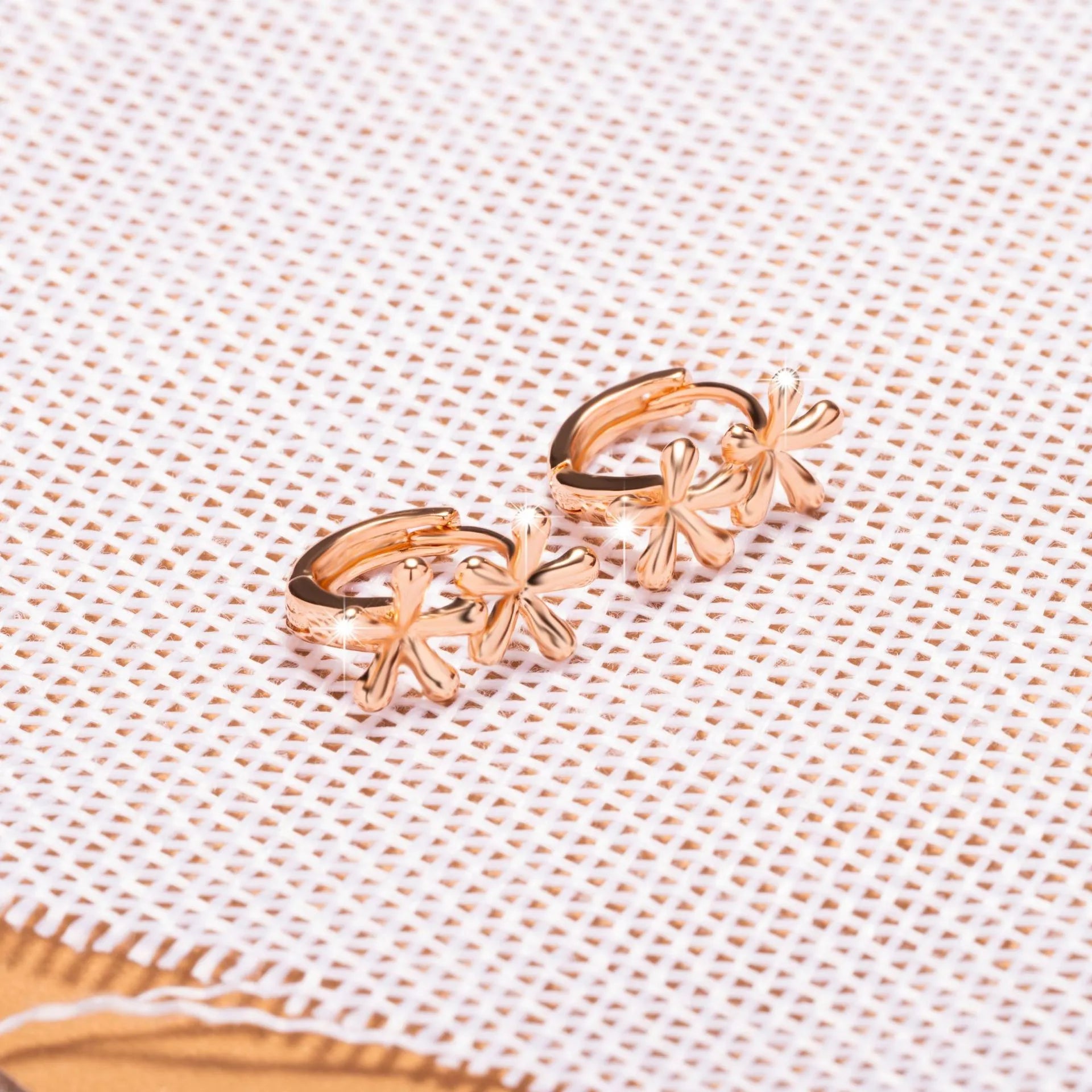 Rose gold electroplated earrings with circular waterdrop flower shape for women