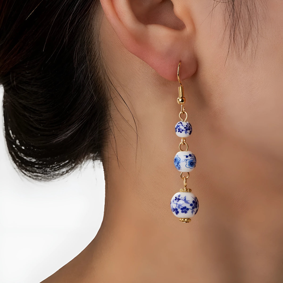 Blue and white porcelain ceramic bead retro earrings with geometric alloy electroplated construction