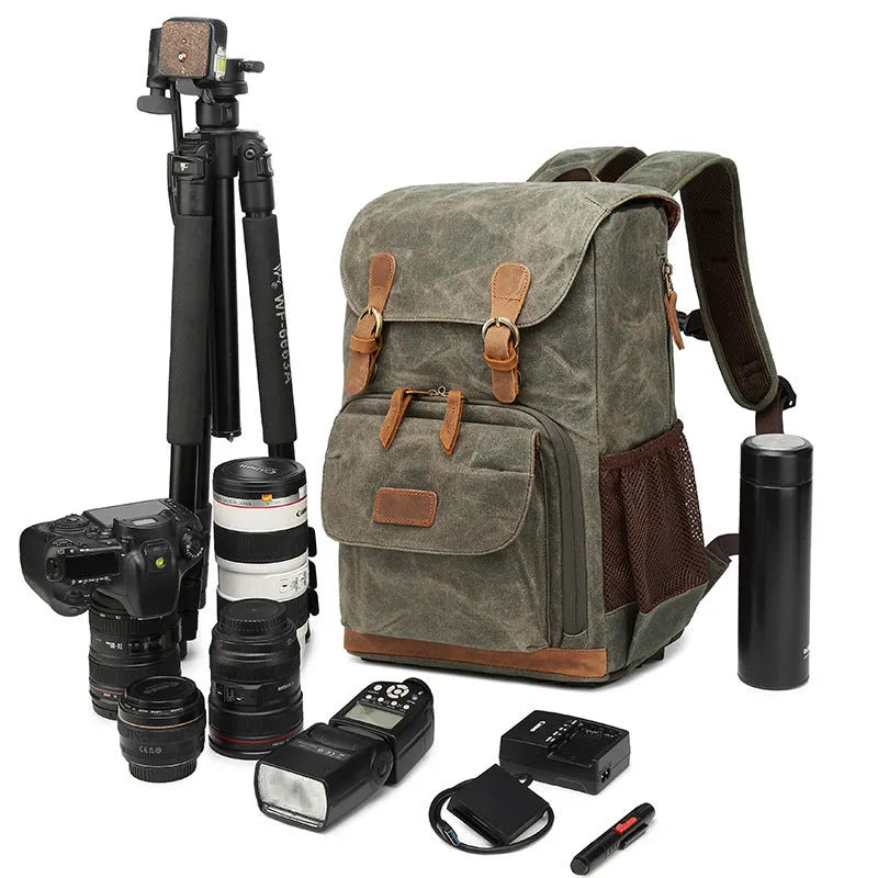 Khaki coloured canvas DSLR camera backpack with adjustable straps shown front-on.