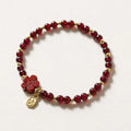 Natural freshwater pearl and geometric crystal bead bracelet with elasticated rope