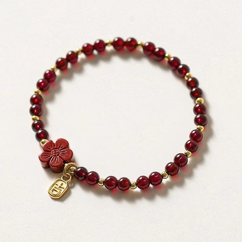 Natural freshwater pearl and geometric crystal bead bracelet with elasticated rope