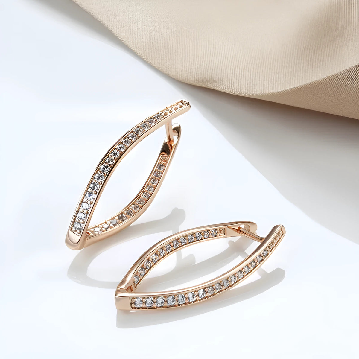 Geometric zircon drop earrings in H0493 colour with copper construction showing structured design lines