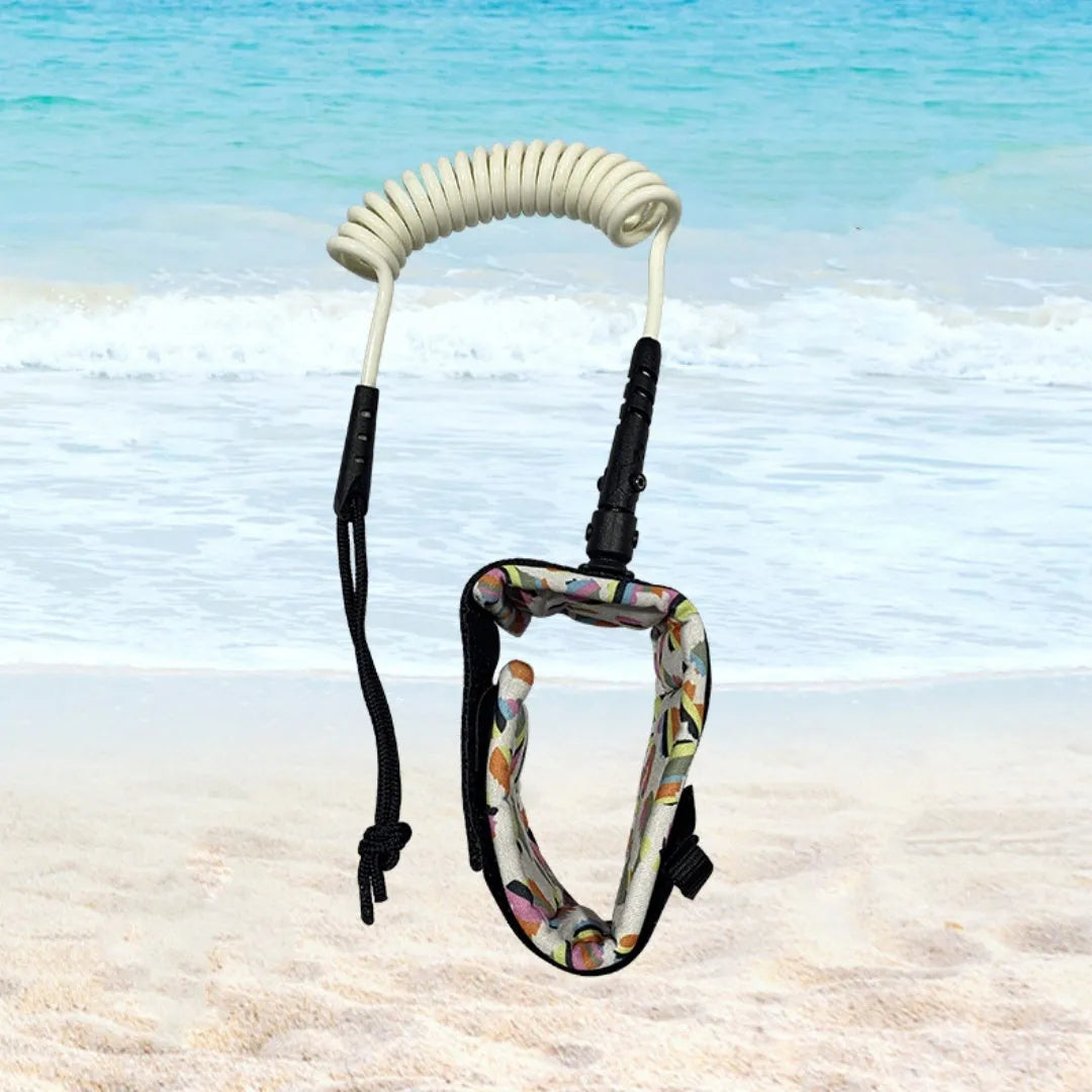 Surfboard hand holding rope showing elastic construction and connection hardware