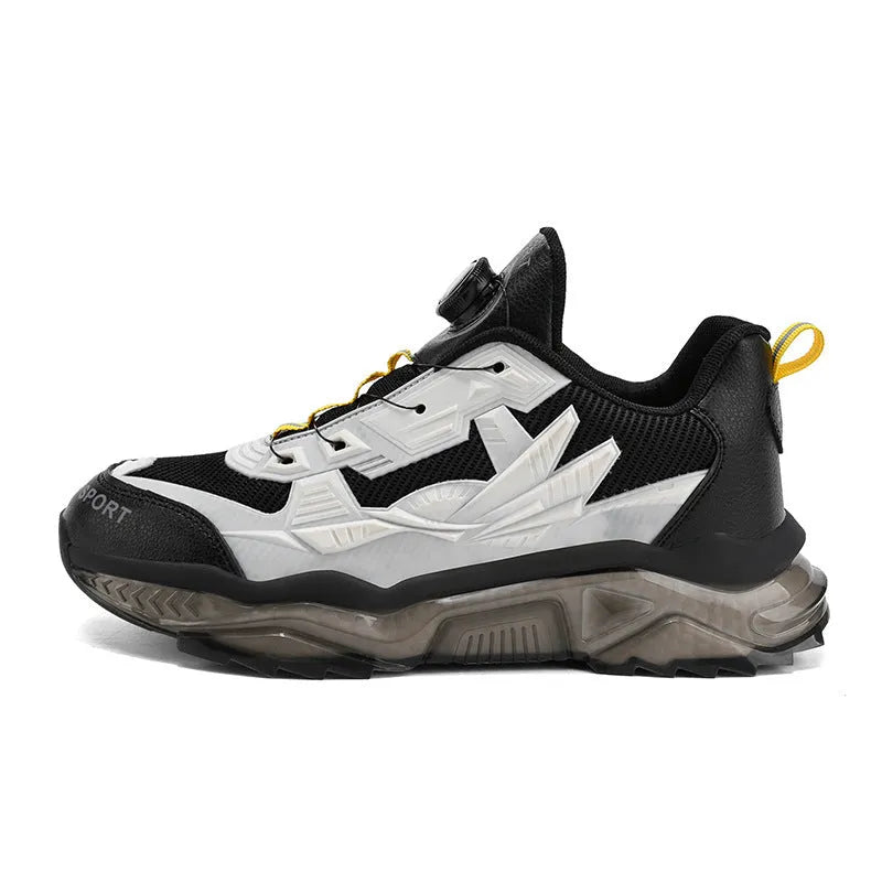 Men's black casual sneakers with rotating button closure and mesh upper on rubber sole.