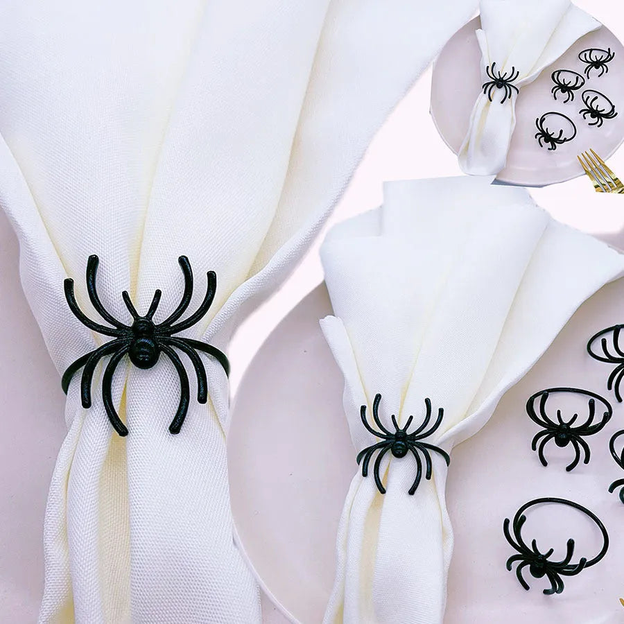 Six black spider-design alloy napkin rings for Halloween table settings