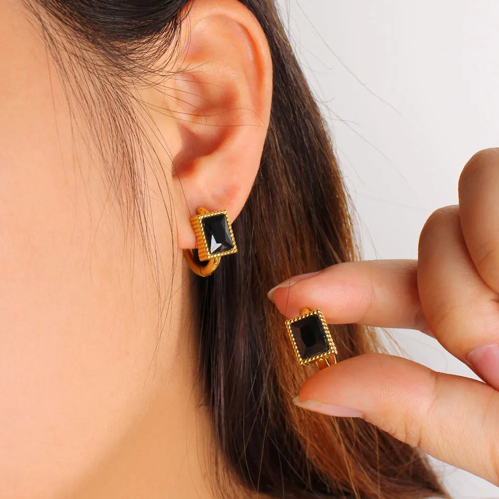 Geometric square zircon stud earrings with a round ring element on stainless steel, in white, black, or green.