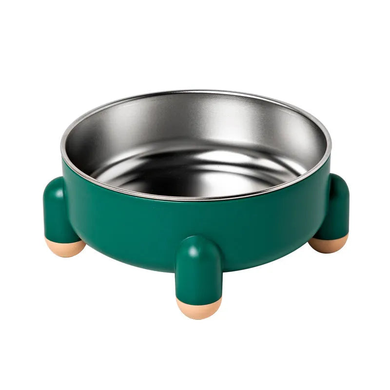 Green non-slip stainless steel pet food bowl with a high foot, shown on a floor.