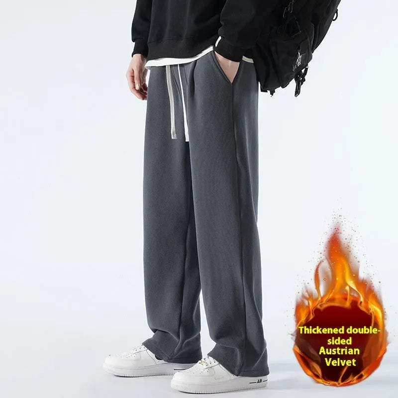 Men's apricot double-sided polar fleece casual trousers with a drawstring waistband, shown laid flat.
