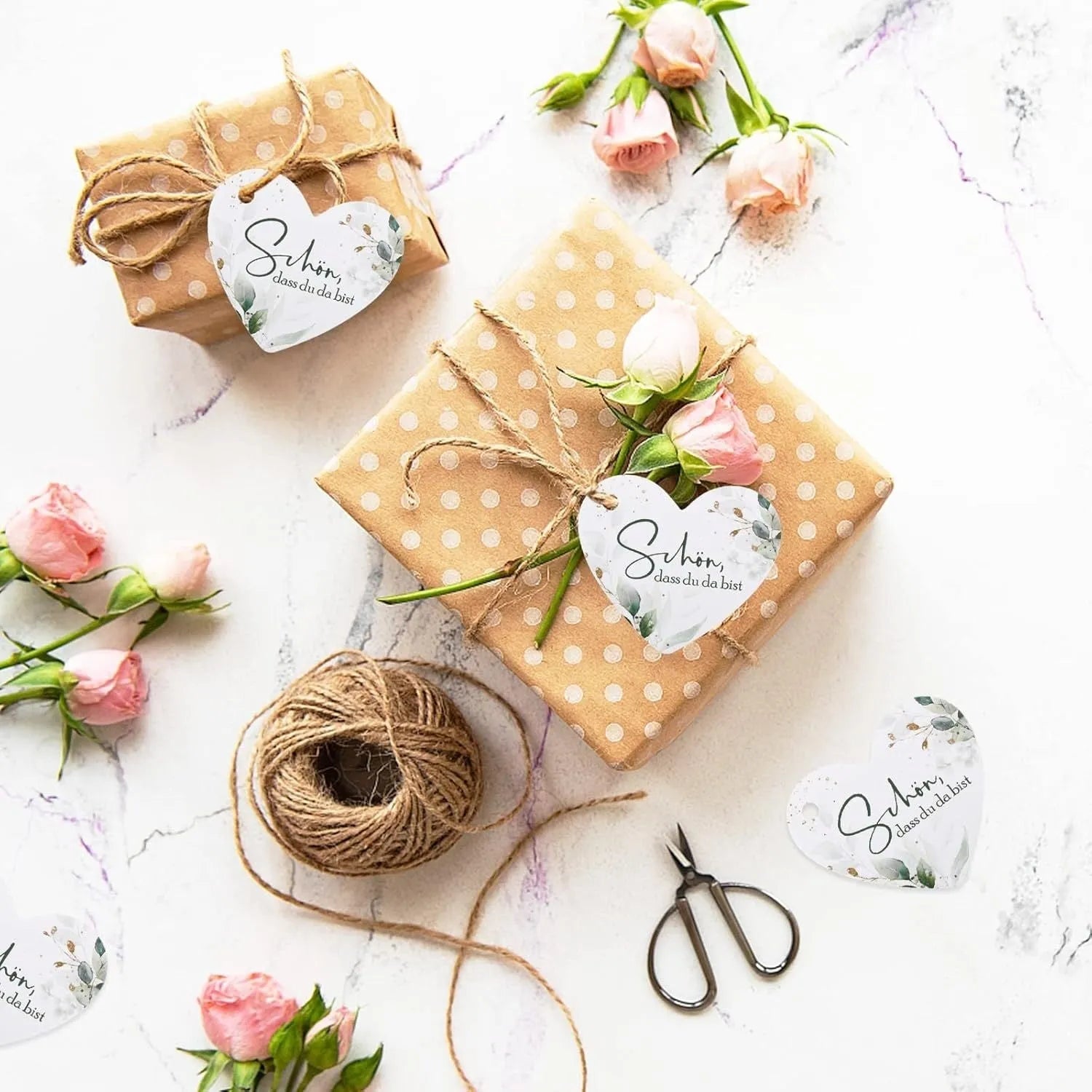 Set of 50 flower heart-shaped paper gift tags in two different decorative styles.
