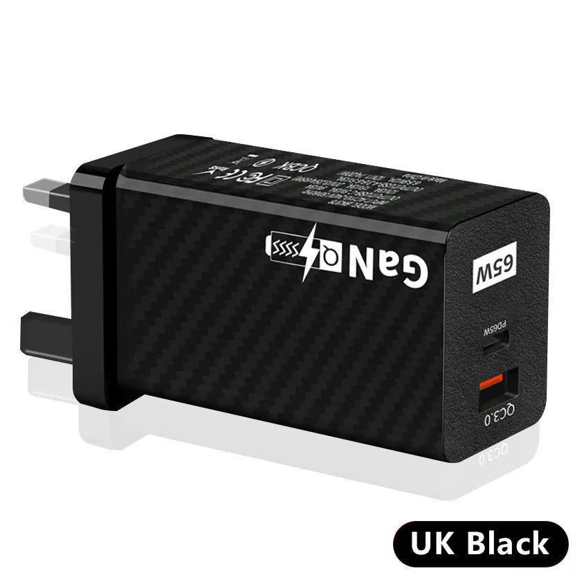 White GaN 65W universal laptop charger with USB PD port showing compact dimensions