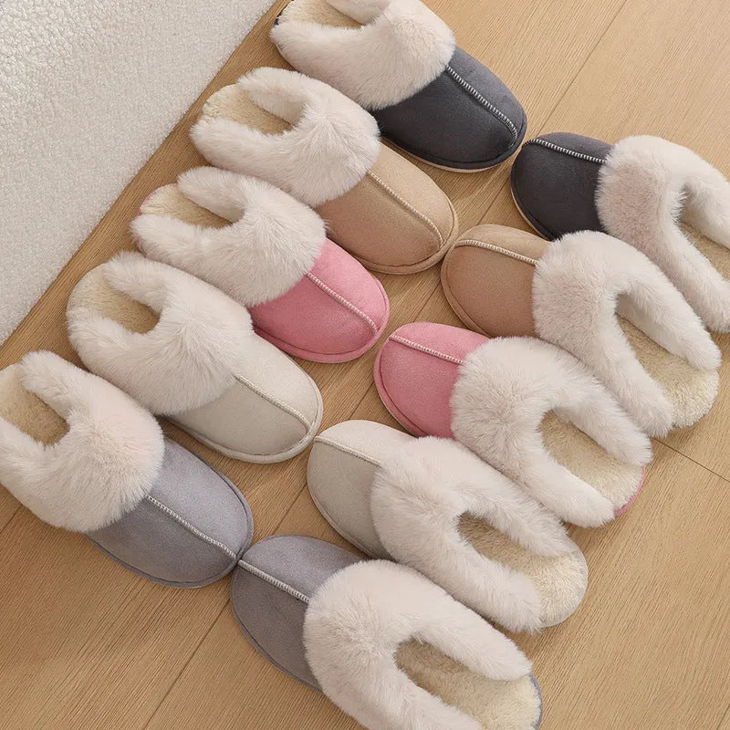 Women's plush winter slippers in pink with a round toe, flat heel, and anti-slip PVC sole.