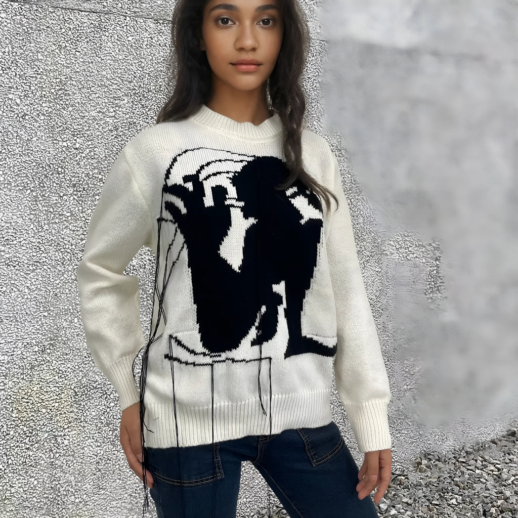 Women's grey alpaca wool sweater with tassel detailing and abstract pattern