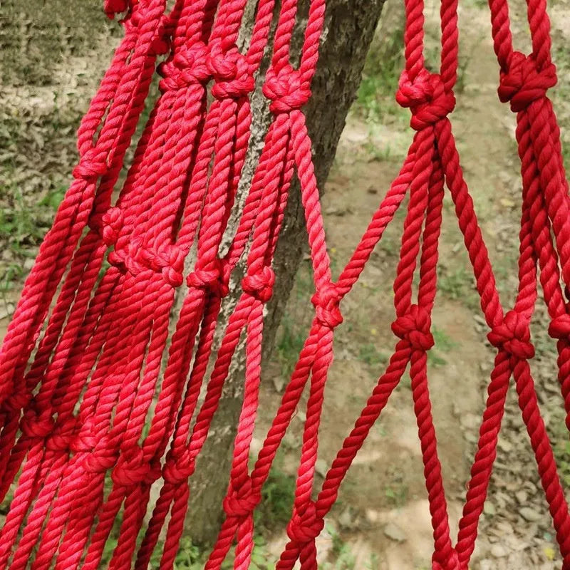 Nylon rope mesh hammock measuring 1.1 metres wide by 2.1 metres long with rope ties