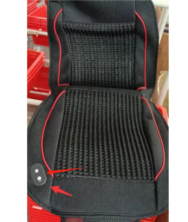 Black car ventilation massage seat cushion with power cord on vehicle seat