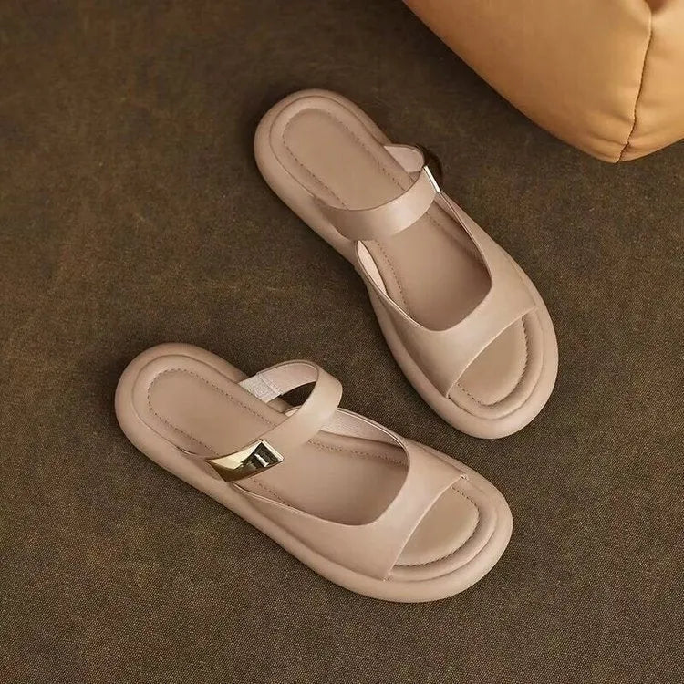 Apricot leather peep toe platform sandals with rubber soles shown from side view