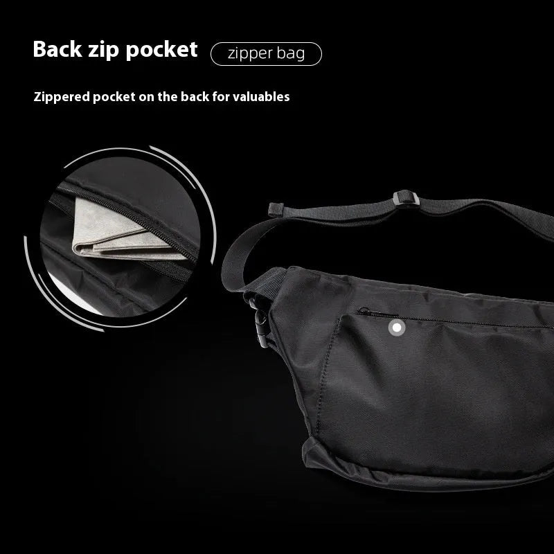 Black men's chest bag with slanted design showing oxford fabric and sewing lines