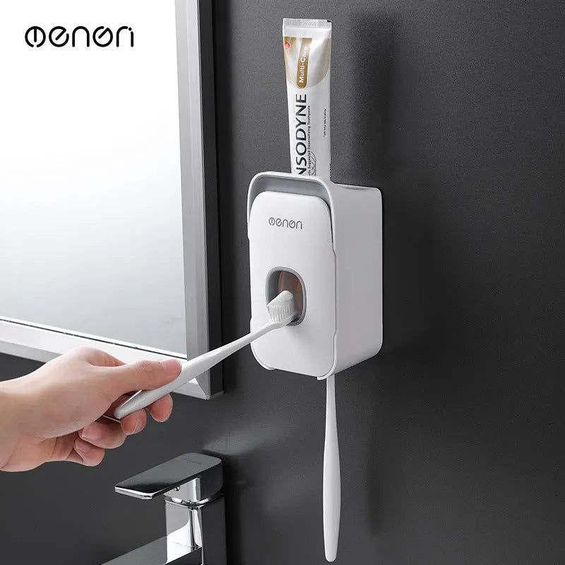 Automatic wall-mounted toothpaste dispenser in blue, grey, or pink colours with LED display