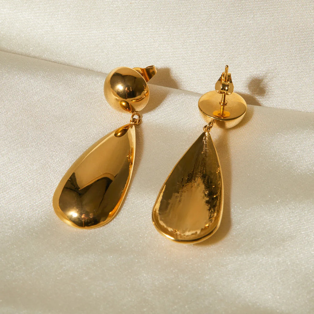 Gold electroplated stainless steel earrings with geometric water drop pendant and hemisphere design