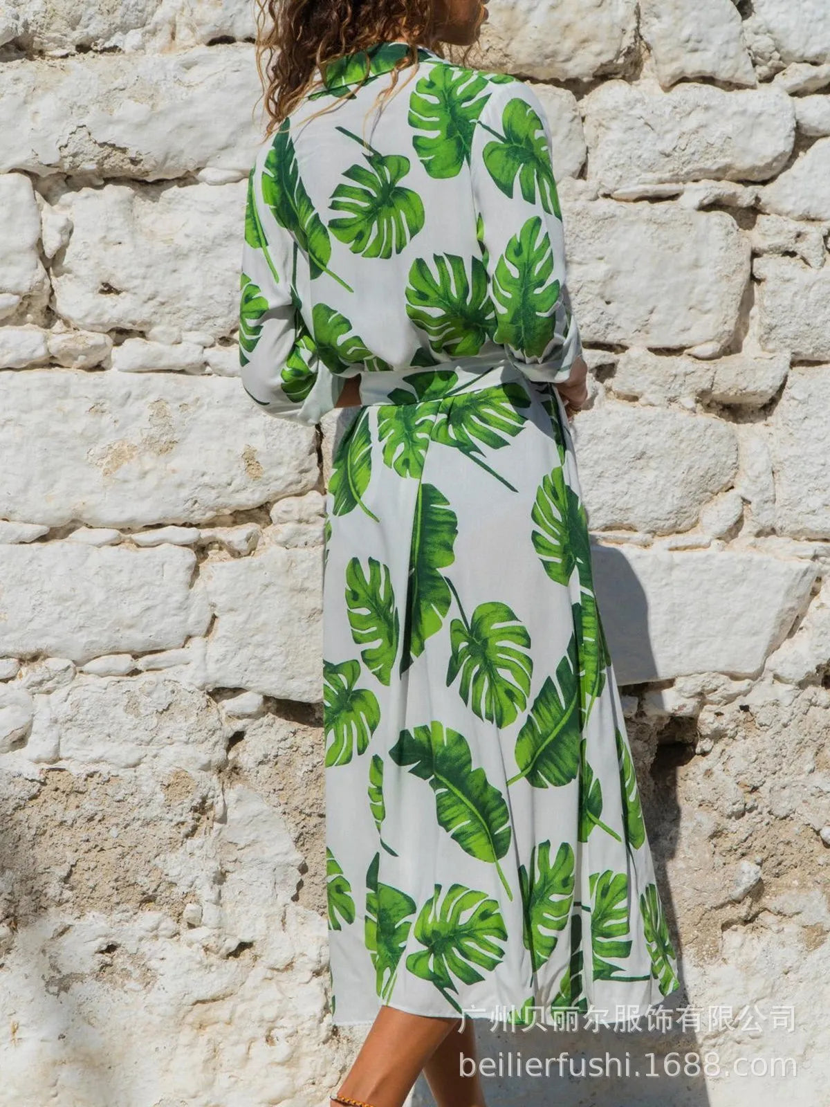 Women's vintage-style chiffon dress with V-neck, high waist, and printed A-line skirt.