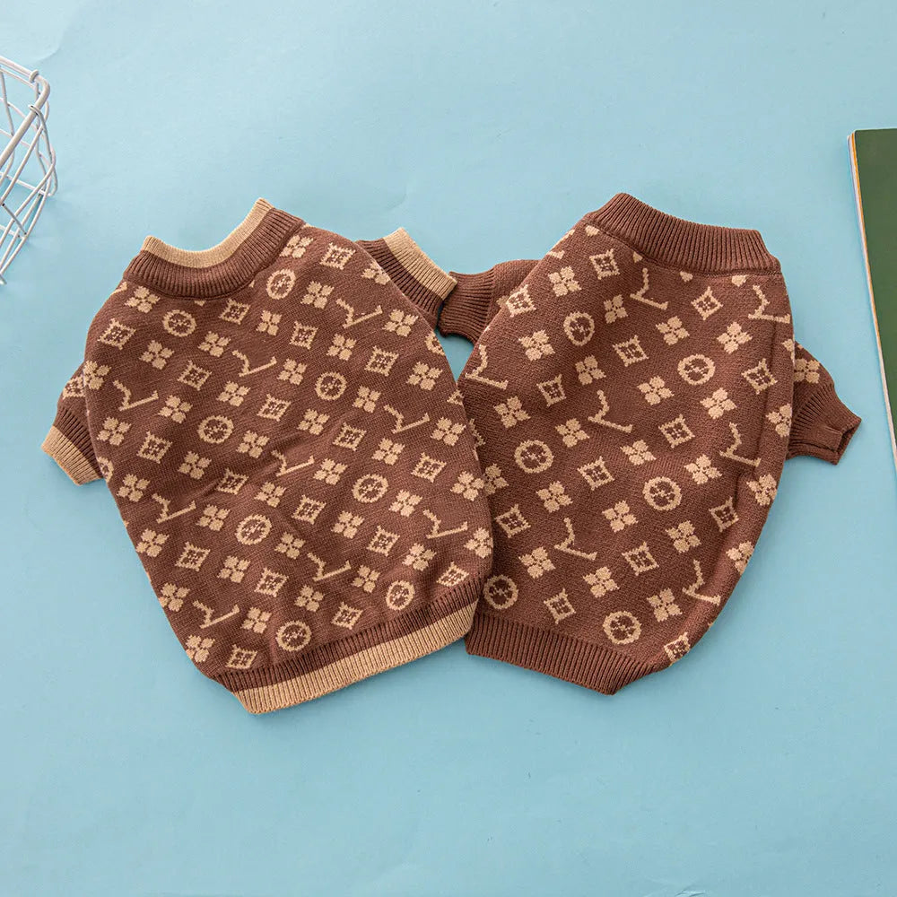 A thick wool dog sweater shown in a monochrome colour, sized for a medium dog.