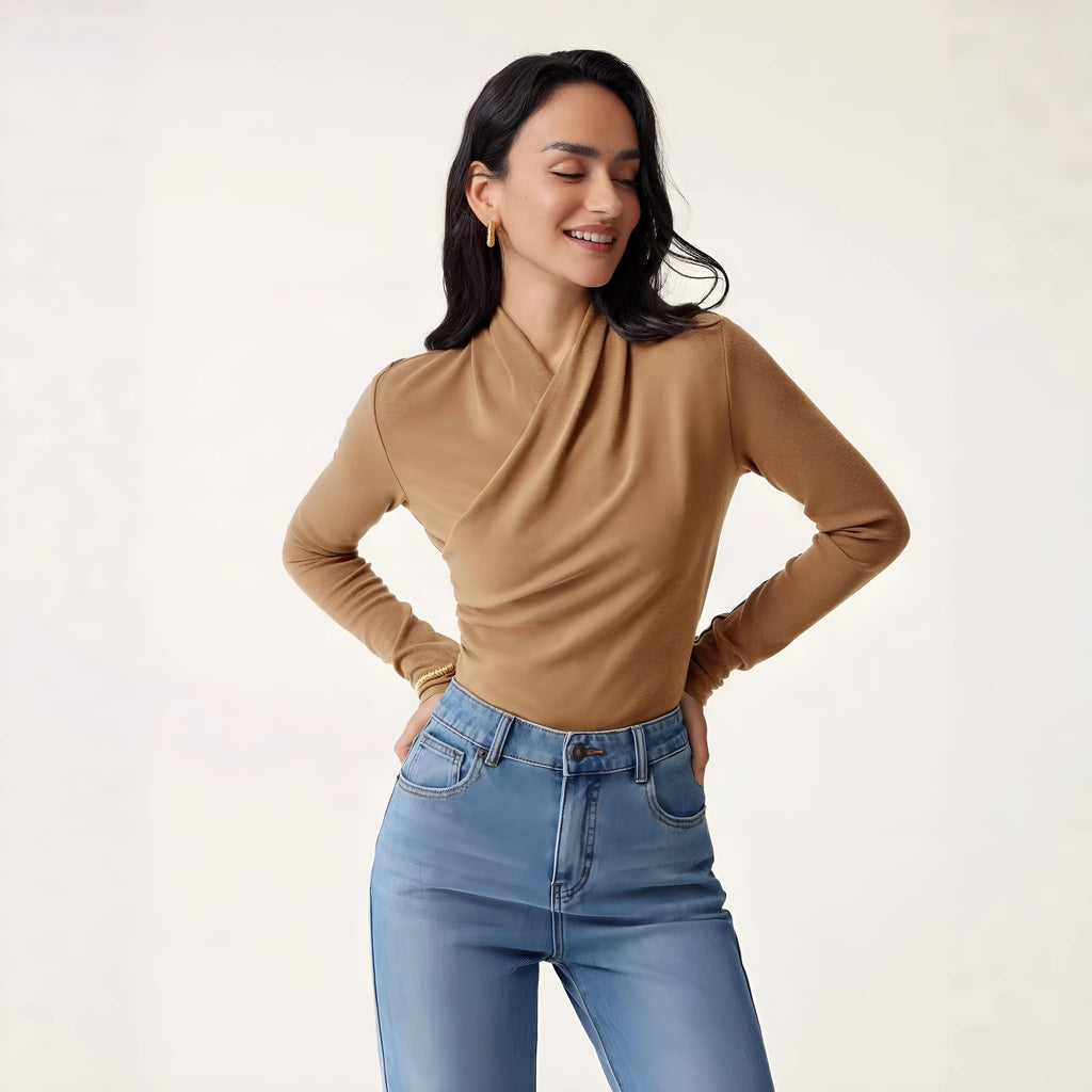 Camel-coloured women's slim-fit polyester pullover sweater on a hanger.