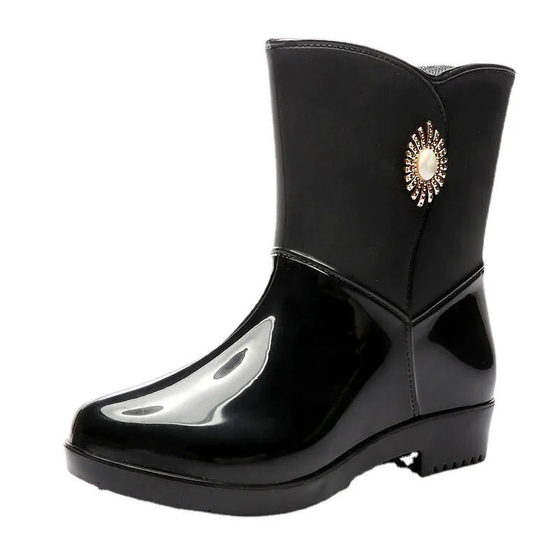 Women's low tube PVC rain boot in beige colour with non-slip sole.