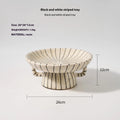 Black and white striped retro synthetic resin fruit plate ornament.