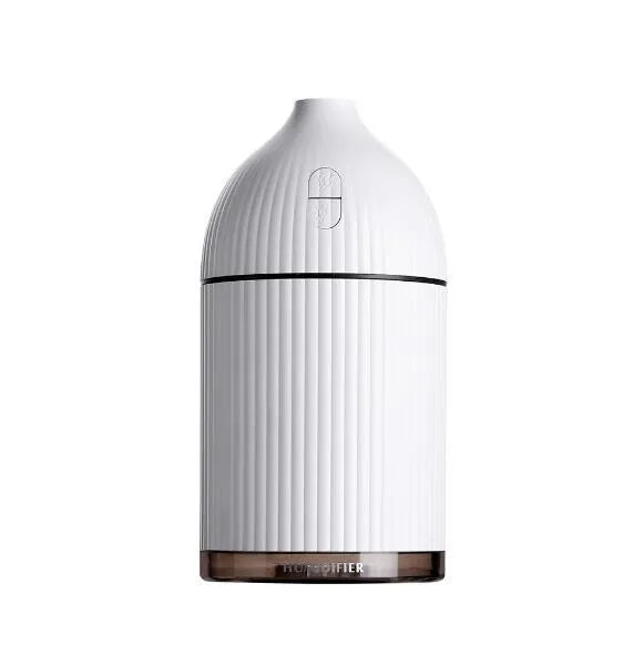 White ultrasonic aromatherapy diffuser humidifier with LED light and 300ml water bottle.